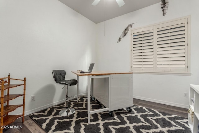 office area with ceiling fan, baseboards, and wood finished floors