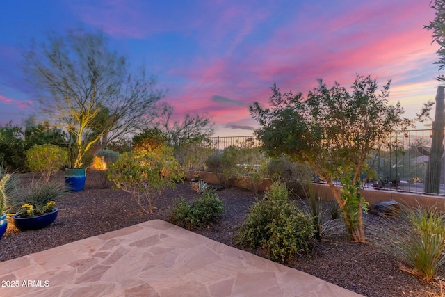 patio terrace at dusk with fence