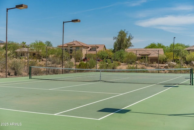 view of sport court with community basketball court and fence