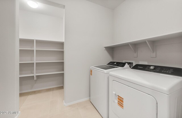 7674 W Cactus Wren Way, Florence, AZ 85132 - laundry room featuring independent washer and dryer, light tile patterned floors, baseboards, and laundry area