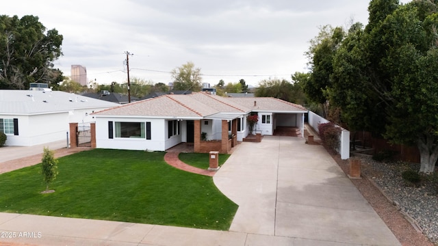 ranch-style house with a front lawn