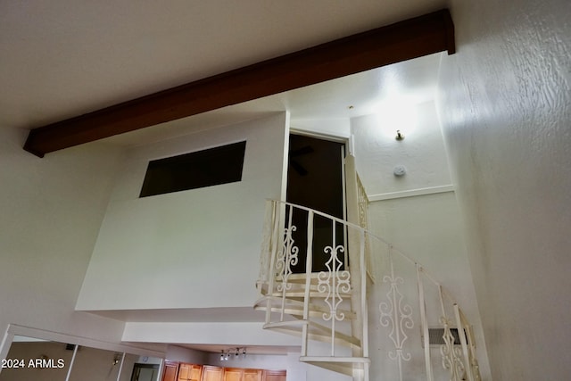 stairs with beam ceiling