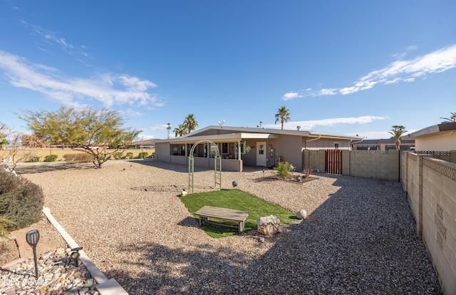 rear view of house with a patio area