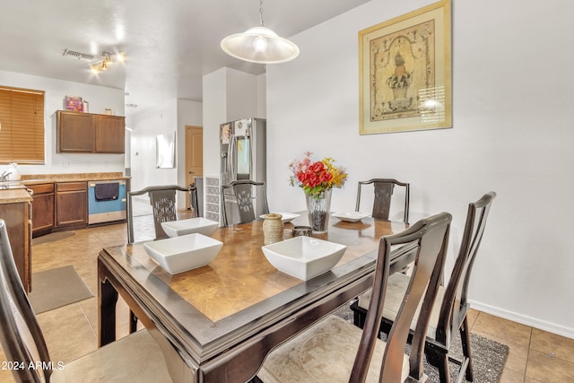 view of tiled dining space