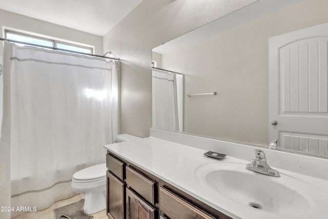 full bathroom featuring tile patterned floors, vanity, shower / bath combo, and toilet