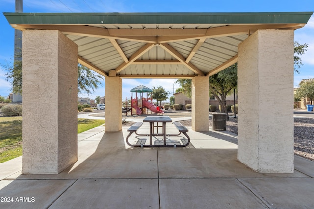 view of patio / terrace with a gazebo and a playground