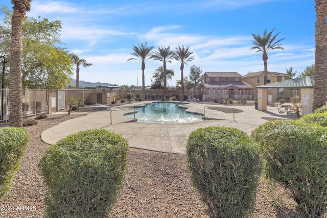 view of swimming pool with a patio area