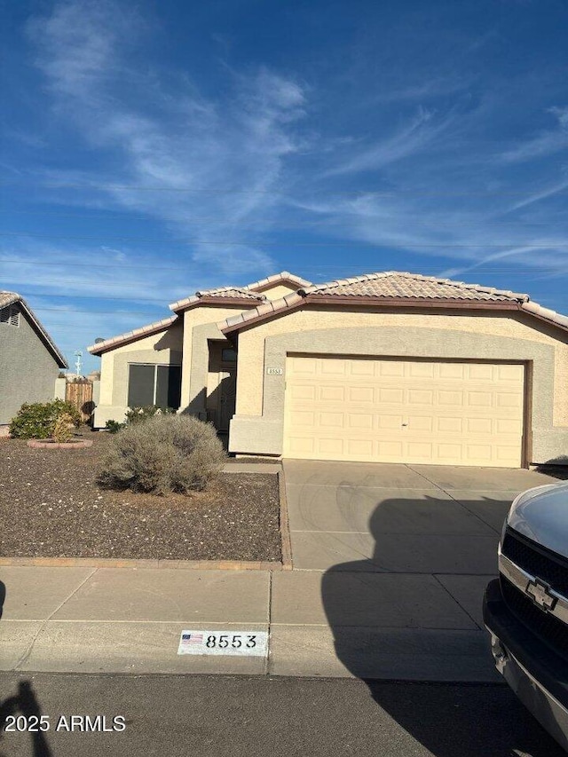 view of front of home featuring a garage