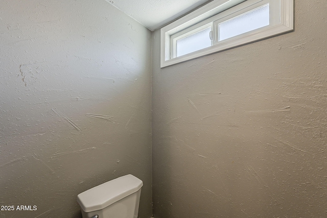 bathroom featuring toilet