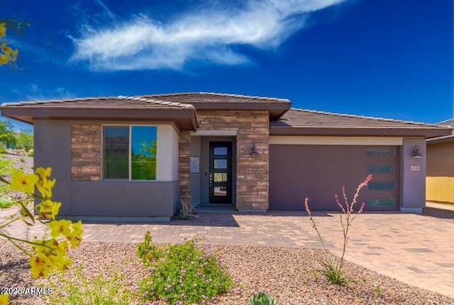 prairie-style home with a garage