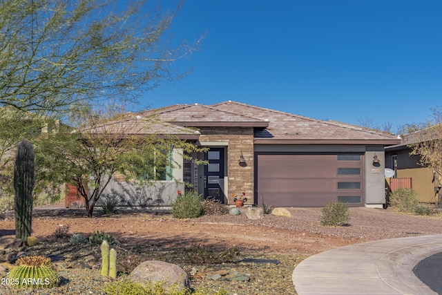 prairie-style home with a garage