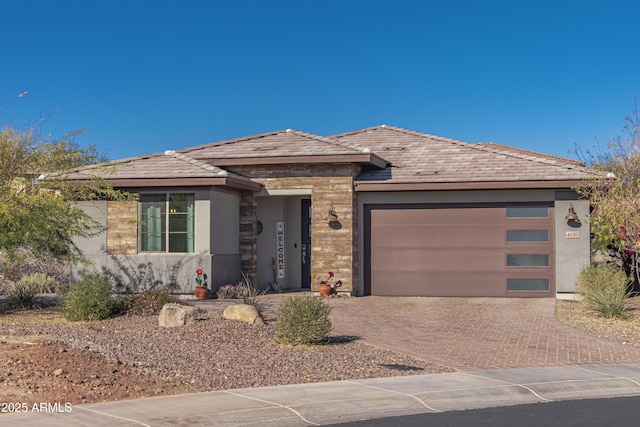 prairie-style home with a garage