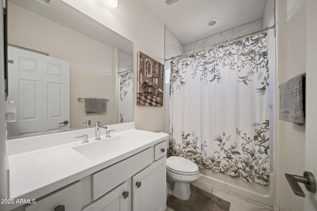 full bathroom featuring shower / bath combo with shower curtain, tile patterned floors, toilet, and vanity