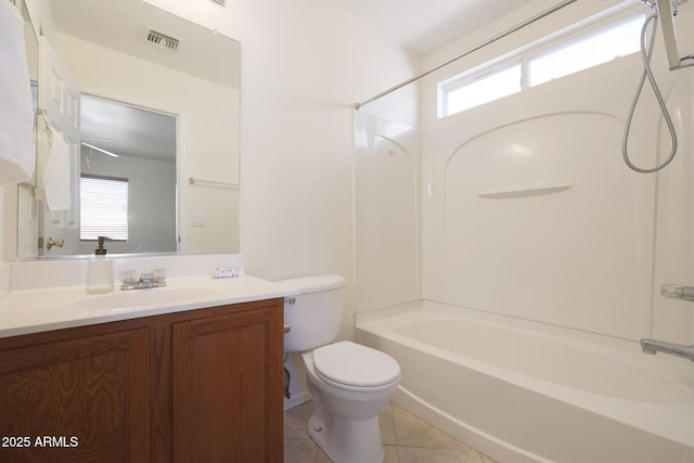 full bathroom with vanity, tub / shower combination, tile patterned floors, and toilet