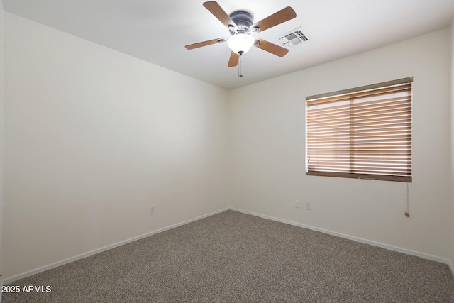 carpeted empty room with ceiling fan