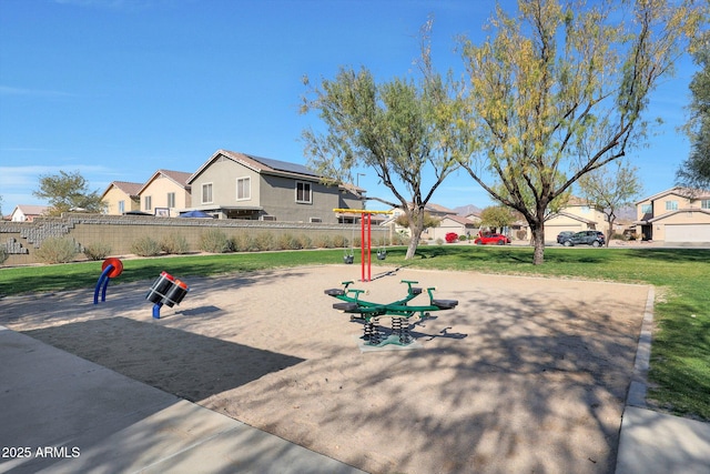 surrounding community featuring a yard and a playground