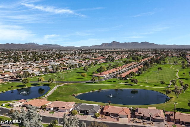 bird's eye view with a water and mountain view