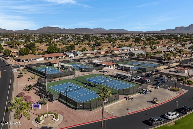 birds eye view of property with a mountain view