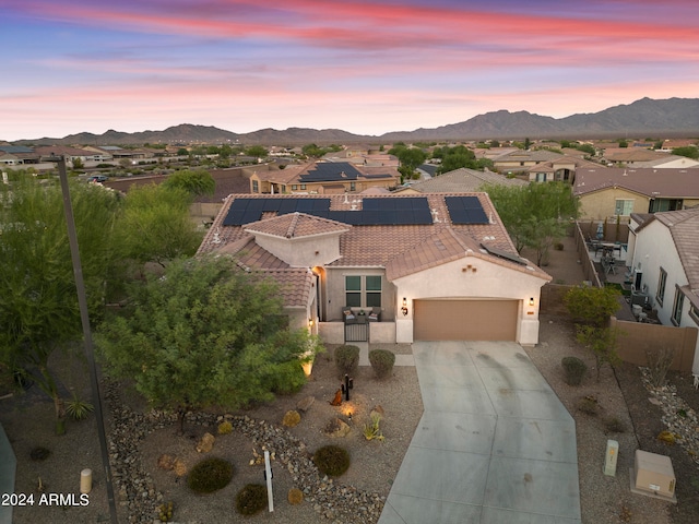 aerial view at dusk with a mountain view