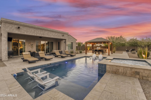 15201 S 183rd Dr, Goodyear, AZ 85338 - view of pool with an in ground hot tub, a gazebo, a fenced backyard, and a fenced in pool