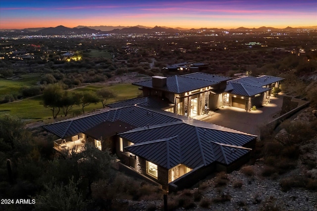 aerial view at dusk with a mountain view