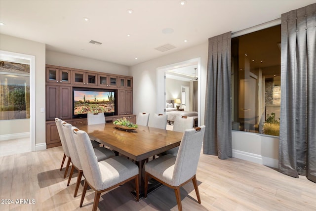 dining area with light wood-type flooring