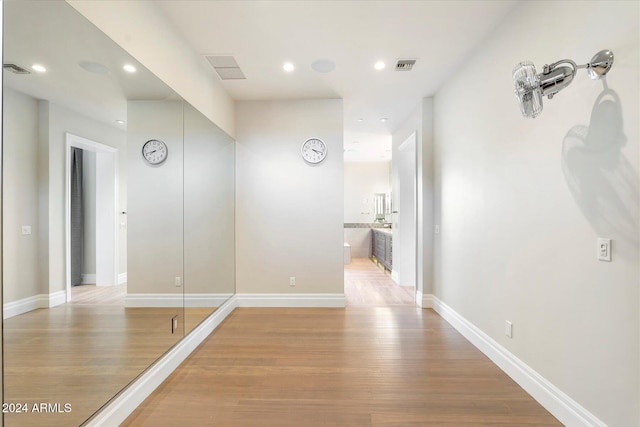 hallway featuring light wood-type flooring