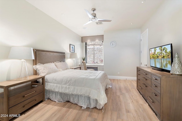 bedroom with ceiling fan and light hardwood / wood-style floors