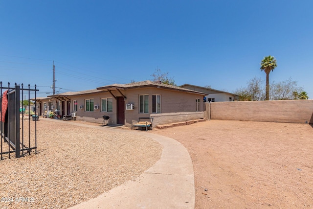 rear view of house with a patio