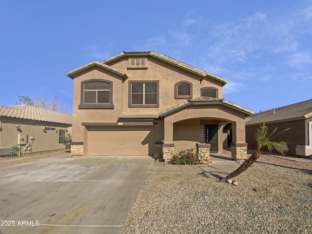 view of front of property with a garage