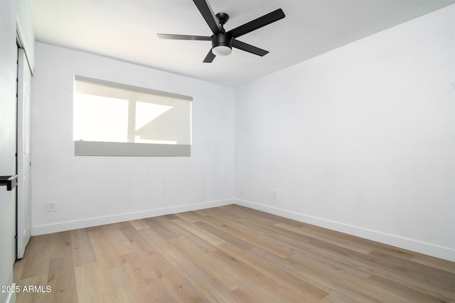 unfurnished room featuring ceiling fan and light hardwood / wood-style flooring