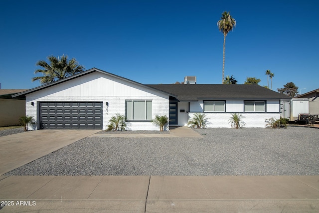 ranch-style house featuring a garage