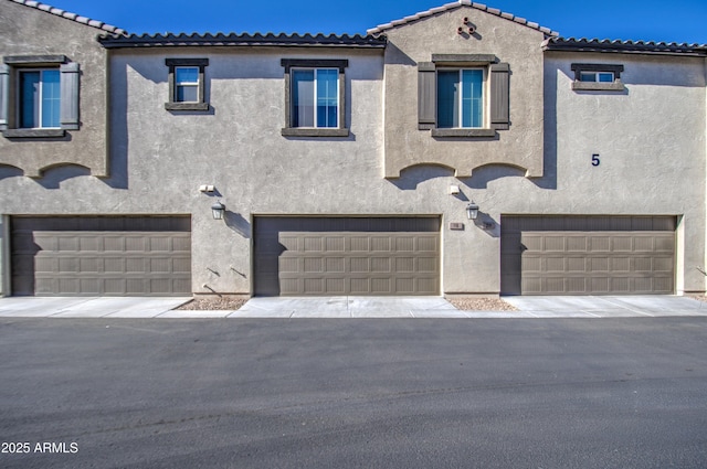 view of front of property featuring a garage