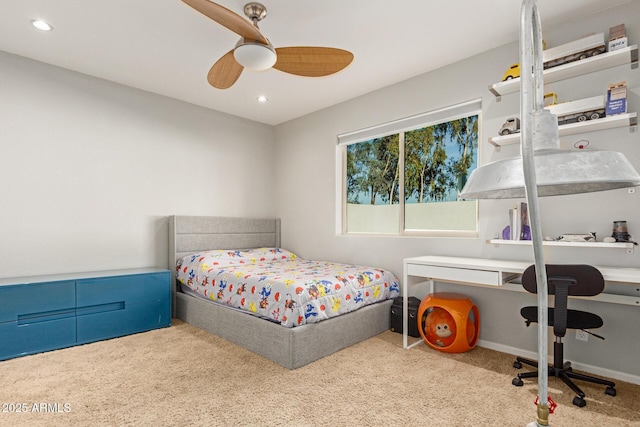 carpeted bedroom featuring ceiling fan