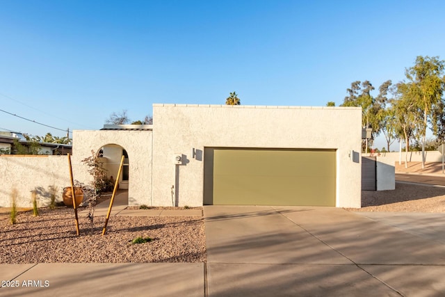 adobe home with a garage