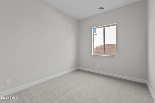 1042 W Ridge Rd, Apache Junction, AZ 85120 - spare room with baseboards and light carpet
