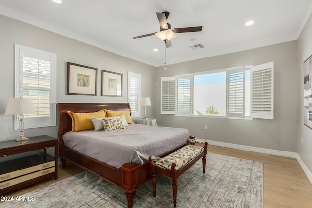 bedroom featuring ceiling fan and light hardwood / wood-style flooring