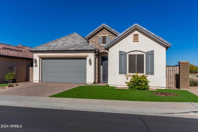 view of front of home with a garage