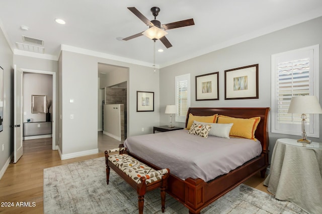 bedroom with ceiling fan and light hardwood / wood-style floors