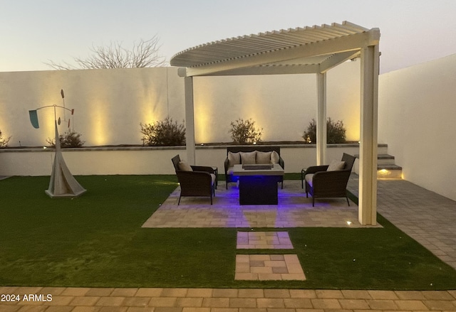 patio terrace at dusk featuring a pergola, outdoor lounge area, and a yard