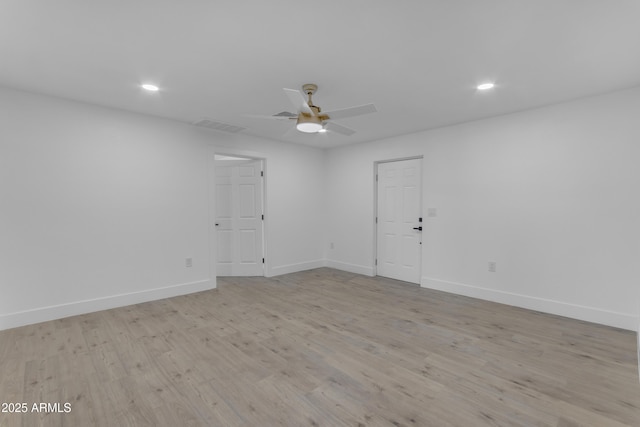 unfurnished room with baseboards, a ceiling fan, recessed lighting, and light wood-style flooring
