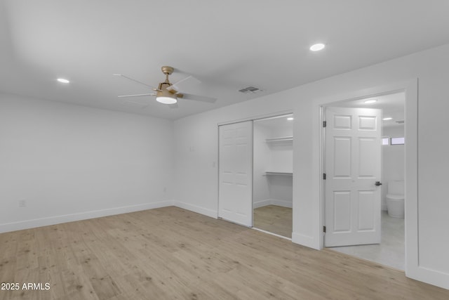 unfurnished bedroom featuring light wood finished floors, recessed lighting, baseboards, a closet, and a ceiling fan