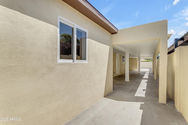 view of patio featuring fence