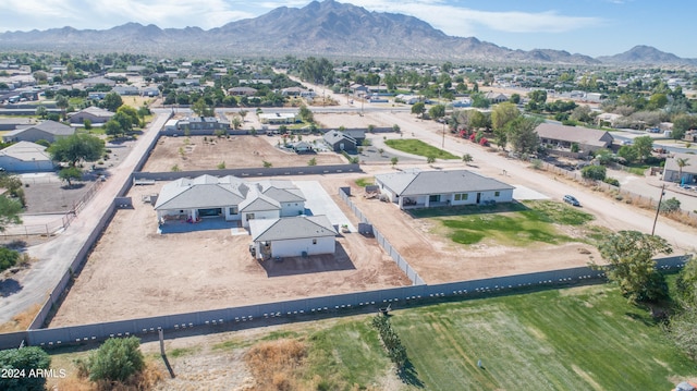 birds eye view of property featuring a mountain view