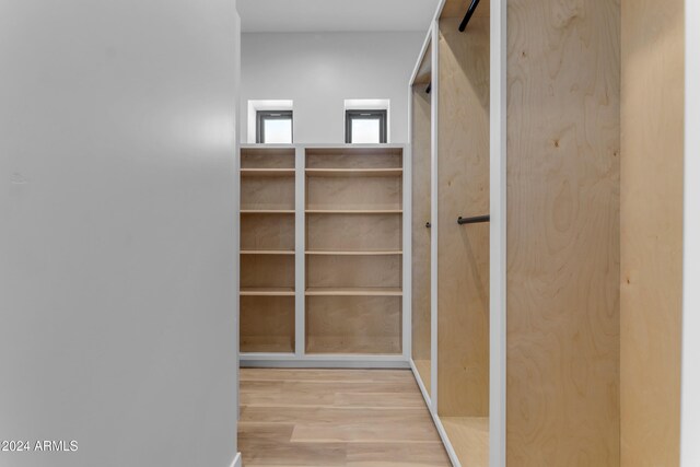 walk in closet featuring light wood-type flooring