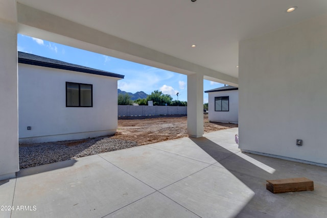 view of patio / terrace with a mountain view