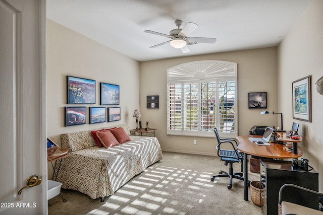 carpeted bedroom with ceiling fan