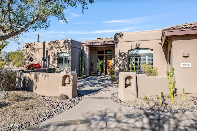 view of pueblo-style home