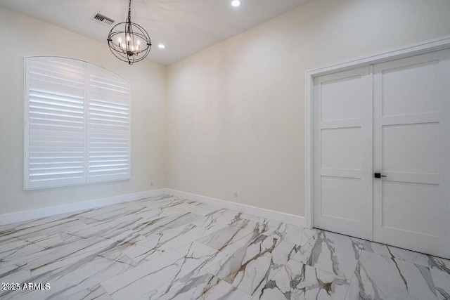 unfurnished room with marble finish floor, recessed lighting, visible vents, an inviting chandelier, and baseboards