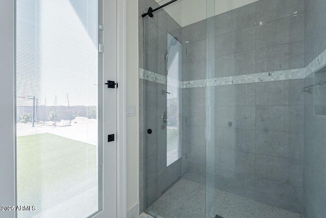 bathroom featuring a shower stall